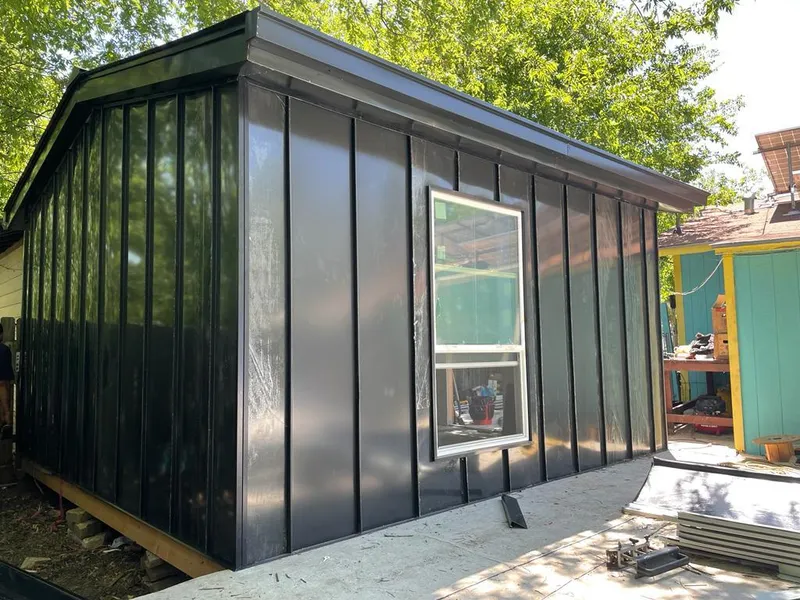 Black standing seam metal wall panels for Metal Roof Installation in Spring Hill